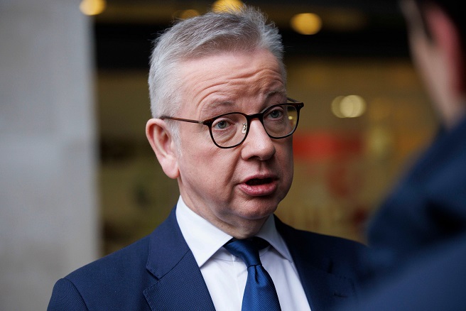 Michael Gove speaking to reporters on Sunday
