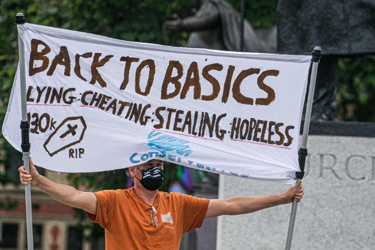 Protester demonstrates against parliamentary sleaze (Credit: amer ghazzal / Alamy Stock Photo) 