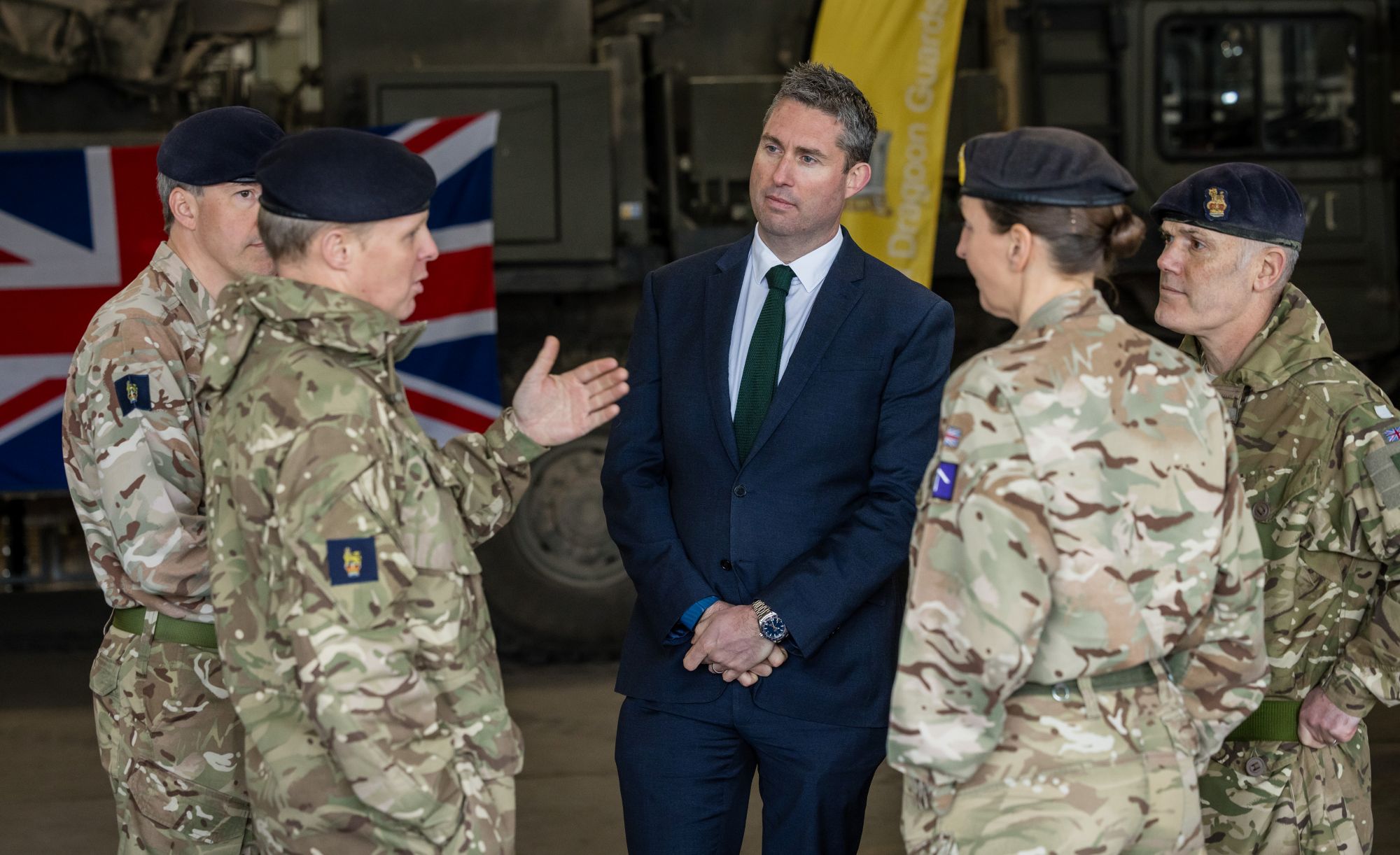 Tom Newman with the UK Ministry of Defence at the signing of a five-year British Army strategic support partner contract