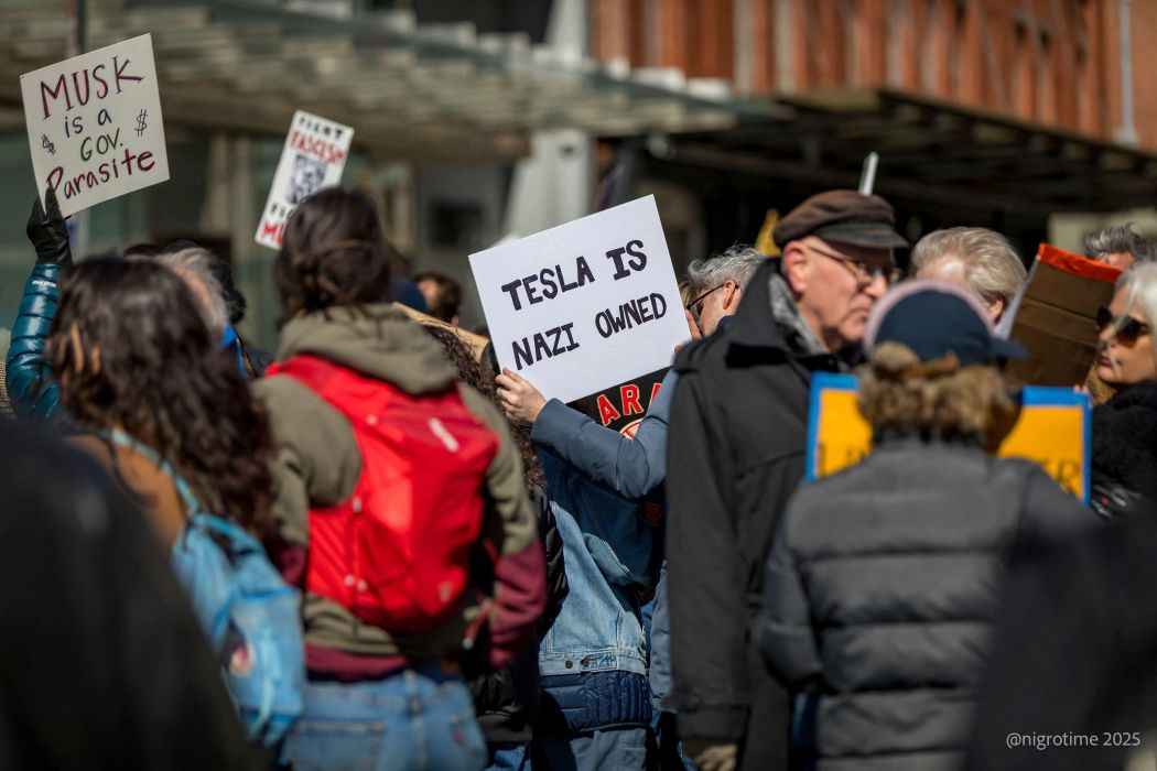 Protests outside a Tesla showroom in Manhattan in response to Elon Musk slashing the federal workforce (Sipa US/Alamy)