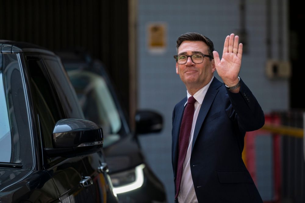 Andy Burnham waving
