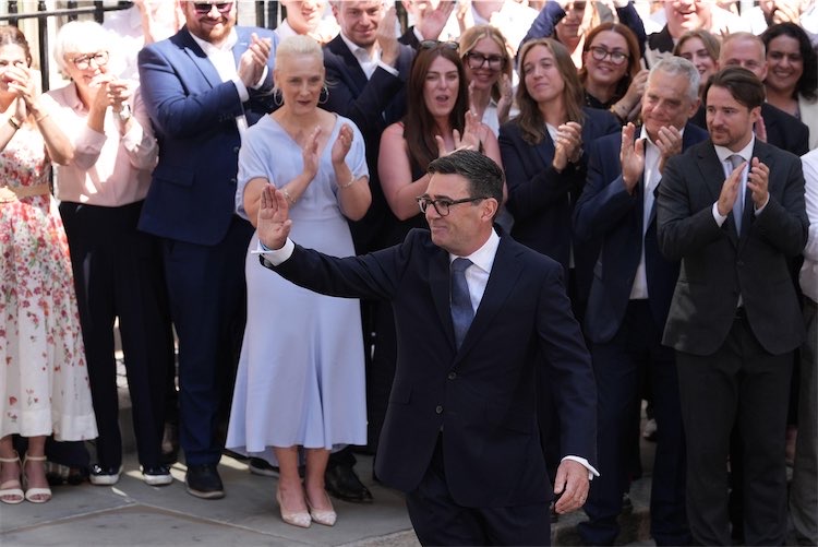 Andy Burnham was greeted by supported on Downing Street before giving his first speech as PM (Alamy)
