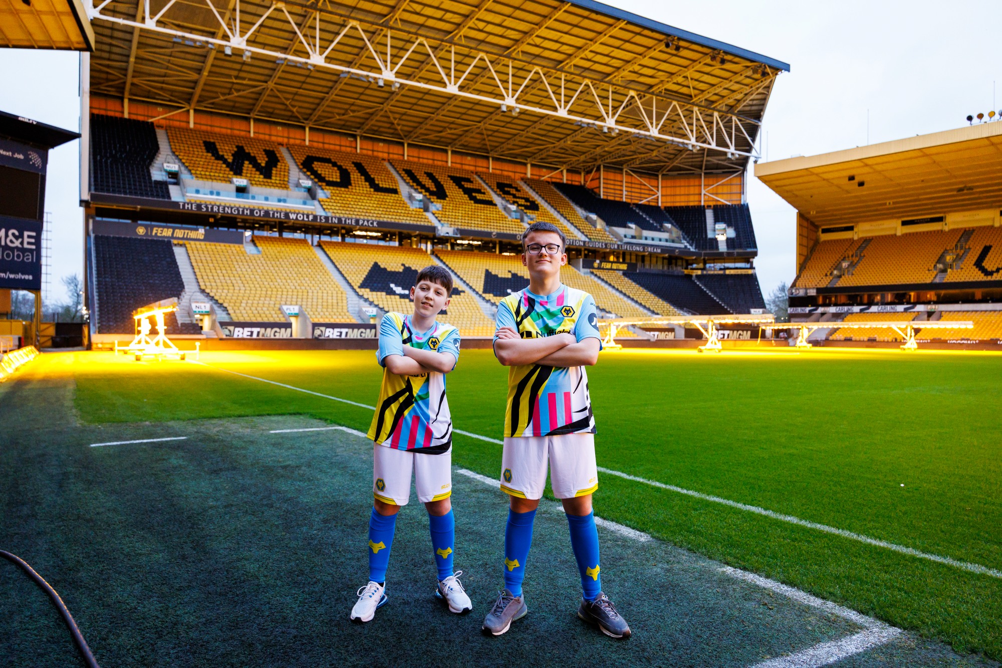 Two boys in a football strip