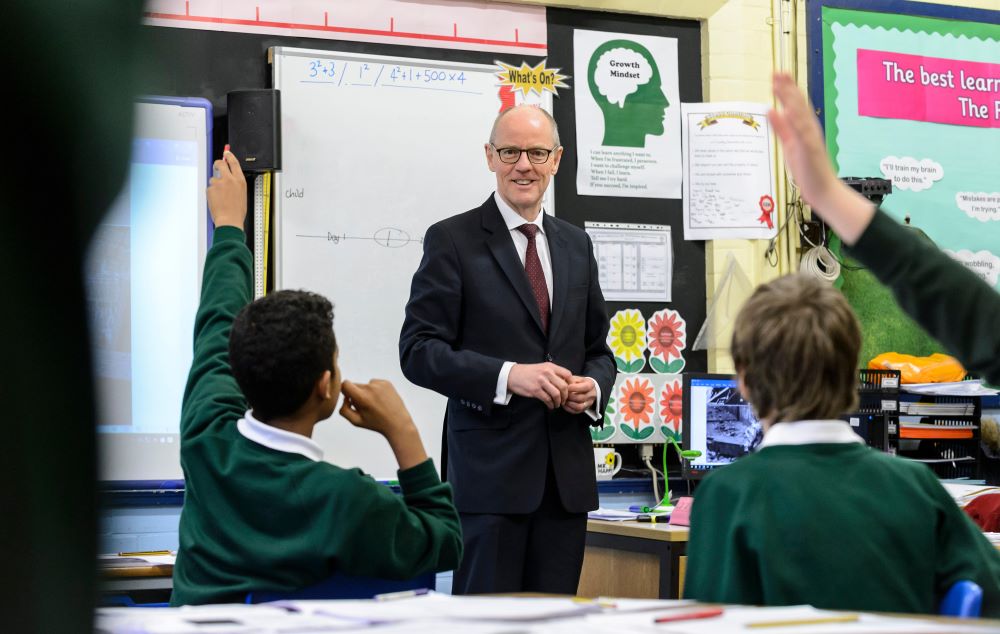Nick Gibb in a classroom