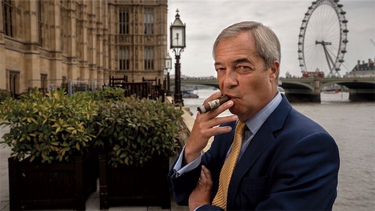 Nigel Farage smoking a cigar on the terrace 