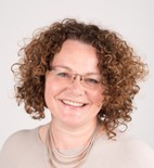 A headshot of a woman
